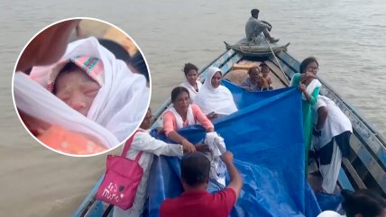   Mujer da a luz en un bote que la había rescatado de inundación 